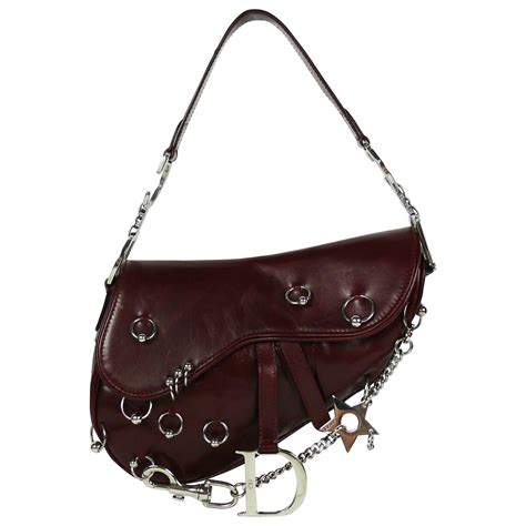 pierced dior saddle bag|Dior saddle bag black inside.